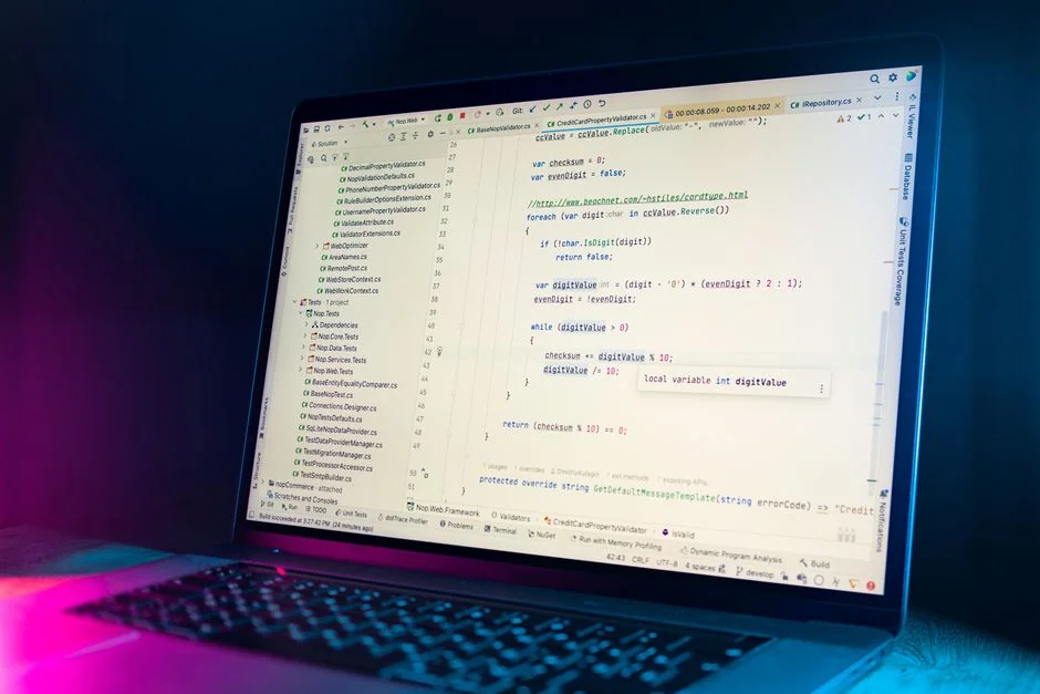 A contemporary workspace with two computer monitors showing web design projects, highlighting technology and productivity.